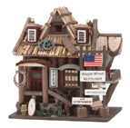 Whimsical 'Wagon Wheel Restaurant' birdhouse beckons birds to stop in for a bite and rest their weary wings for the night.