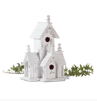 Victorian-style birdhouse features four roomy perches. Distressed white-finished wood with gingerbread trim has an heirloom look.