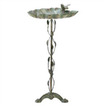 Balanced at the edge of a broad green leaf, a sparrow lifts his voice in a joyous springtime song. Distressed finish gives this handsome metalwork birdbath the appearance of a well-weathered antique.