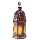 Candlelight takes on a dramatic air as it shines through golden pressed-glass panels and lacy cutout metalwork. A stunningly illuminating decoration!