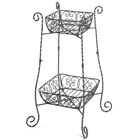 Graceful wrought-iron curlicues combine to create a fetching stand for your favorite plants; two-tiered design makes a handsome space-saving display!