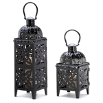 An ornate metal candle cage makes a stately statement, lavished in high gloss midnight-black finish. An perfect fusion of form and fascination!