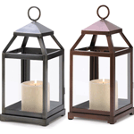 The modernized framework of this glass-paneled hurricane lamp, making it the perfect finish for any special setting. A handsomely understated addition to your favorite room! Loop at top for hanging; can also stand freely on table or shelf.