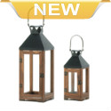 Rich wood and black metal mix and mingle to create a stunning candle lantern that makes a big style statement. The clear glass panels let the light from your favorite candle shine bright, and the stainless steel hanging loop is both fashionable and functional.