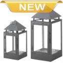 These candle lanterns are the perfect blend of classic design and contemporary style. Four clear glass panels sit inside an iron framework finished in matte black, for a thoroughly modern lighting accent that will stand the test of time. The pyramid roof adds drama and visual appeal!