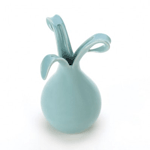 Precious petals cast in pale blue ceramic make a beautiful decorative accent for your room. This small vase features a bulbous bottom that tapers and transforms into flowering petals at top. 