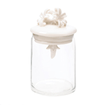 Flowers bloom on the porcelain top of this charming glass jar. The ivory lid features pretty flowers and a decorative final that hangs below. Fill the jar with decorative items or simply display it solo - either way, its an appealing addition to your decor. 