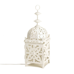 All the charm of a candle lantern, with the convenience and reliability of an electric lamp! This gorgeous table lamp features a single interior bulb that creates a spectacle of light and shadow from within this metal lanterns intricate cutout pattern.