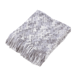 When its cold and rainy outside, wrap up with this comfortable and pretty monochromatic knit throw blanket. The gray and white color scheme makes it a perfect fit for any decor, and the soft fringed ends give the blanket a welcoming appeal. 