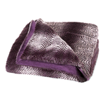 Relaxing has never been so stylish! This gorgeous orchid ombre throw blanket is dreamy soft and the lush purples that swirl to make its pretty pattern will wake up your rooms decor. The flip side features solid deep purple thats just as cozy! Machine wash. 