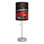 Two of the finest examples of elegant engineering and magnificent motoring come together to create an extraordinary lighting accent! This slim stainless steel lamp base is topped with a dark shade thats adorned with the image of a classic Corvette and beautiful airplane. This is a great addition to your man cave or a cool gift for anyone who appreciates the finer machines in life. 