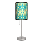 A pop of color and a dash of fascinating design, this lamp will light up your space while amping up the style quotient. The slim stainless steel base lets you add this charming light just about anywhere, and the shade features a chevron design with cool blue and white birds. 