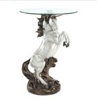 A golden-maned unicorn stands resplendent in the shy light of dawn; the very image of magic and might. Captivating statue base gives this fantasy table a legendary appeal! Clear glass top allows enjoyment from every angle.