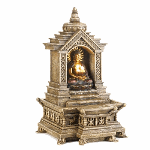 Buddha reclines within the shelter of his temple as cascading blessings flow from his glowing basket. Faux-stone tabletop fountain is the perfect centerpiece for your own shrine of serenity! 