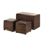 A coffee table, side table, ottoman extra seating, storage— this set is all of those things at once! Dark brown woven wicker with padded tops, the large trunk and two matching ottomans are perfect for resting your legs after a long day, as additional seating, and for storing or stashing clutter when entertaining guests.