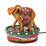 Every color and gleaming gem reflects the joy of a mother and child at play! Traditional elephant motif fountain brings a vibrant hint of the exotic that enlivens any décor, along with the merry music of cascading water.