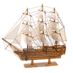 Your imagination sets sail from the very first look at this lifelike model schooner! Lovingly built from genuine wood and canvas, its craftsmanship is evident in every detail. A true work of art that will grace your home with high-seas distinction! 