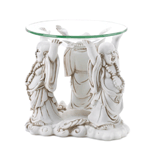 Add some smile-worthy Zen and great aroma to your living space with this trio of happy Buddha! This oil warmer features a sleek glass basin, ready for the scented oil of your choice, held aloft by three Buddha figures. 