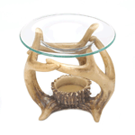 Fill your room with fresh aroma and a touch of woodsy style. This antler oil warmer features a clear glass basin for the scented oil of your choice and you can nestle a tealight candle inside the sculptural base. 