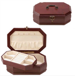 Keep your precious possessions elegantly organized in this rich rosewood finish jewelry case! Finely crafted of lustrous wood with a luxurious velvet lining, this handsome jewelry box features plentiful storage and a special lift-out segmented tray.