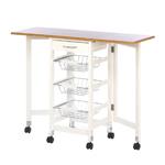 Could your kitchen use some additional storage space and extra work space? This is the perfect space-saving addition that gives you everything you need. Three handy wire baskets slide out of the trolley along with a pullout drawer for super storage, and when you need more flat work space, the table extensions on each side lift up to create a great table!