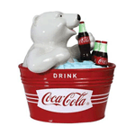 From the Coca-Cola Collection, it's the Coca-Cola Polar Bear Cookie Jar! This ceramic cookie jar measures 9 3/4-inches tall, and features the polar bear from the Coca-Cola commercials sipping a Coke from inside a red ice bucket that reads, "Drink Coca-Cola." The Polar Bear Cookie Jar makes the perfect gift for the vinDescriptione Coke collector! 