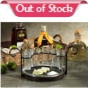 Start your own fiesta at home with this iron and glass shot set. Six tall shot classes sit in an attractive iron stand, and the glass tray below is the perfect caddy for lime wedges and salt! Hand wash only. 