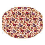 Vibrant patterns of garnet, sapphire and cream turn any occasion into a royal feast! This classic gold-rimmed serving tray is an appealing way to serve your guests in true Far Eastern style and grace.