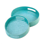 Serve up cocktails to dinner guests or make an impressive display on a credenza with a collection of objets d’art with these chic nesting trays. Turquoise crocodile pattern gives a sleek sheen while making the trays easy to clean. A classic form in a modern color make for a contemporary home accent!