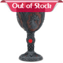 Fit to reign at the head of any grand banquet table, this bejeweled goblet beautifully recalls the tales of mighty kings and queens. Fantasy comes to life in every intricate detail of rich scrollwork, gleaming gems and a dragon’s head crest. Crafted of durable resin with removable stainless steel inner drinking cup.