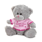 Show mom how much you care with this sweet plush bear. This little charmer has the softest gray fur and is wearing a fleecy pink top with "Worlds Best Mom" embroidered on it. 