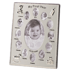 Silver-tone frame creates a miniature gallery of your baby’s first year! Twelve oval openings surround a large center window; add a photo each month as your little one grows.