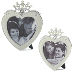 Give the special photo thats closest to your heart a special frame! This beautiful pewter heart is topped with a rhinestone crown, fits a 5x5 or 3x3 photo, and has an easel back for tabletop display. Pewter & Glass.