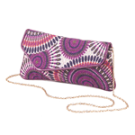 The colorful embroidery on this asymmetrical clutch and shimmering detachable gold chain make it perfect for daytime use and those special evening occasions. Fabric pattern on actual product may vary. A gorgeous finishing touch for your prettiest outfit!	