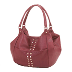 Take your style to a new level with this rich tote bag. The oversize design is highlighted by the geometric gold stud detail running down the front of the bag. The alluring merlot hue makes it a great accent to any outfit. 