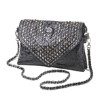 This edgy clutch purse will add a little wild style, day or night! The black-on-black skull pattern purse features stud and sparkle details punctuated by a silver skull and detachable chain strap. 