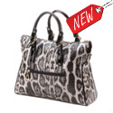 Sophisticated style with just a hint of wild side, this gorgeous tote bag will elevate the style of any outfit. The neutral-tone leopard pattern get a fantastic textured finish, black handles, and golden hardware.Outside pocket with zipper closure, inner pockets with zipper closure and inner bag compartments. Zipper closure. 