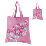 Luscious pink tote has a secret you simply have to see to believe! Outdoor sunlight magically brings out the splashy color images hidden inside the graphic instantly, for a designer look that’s twice as nice.